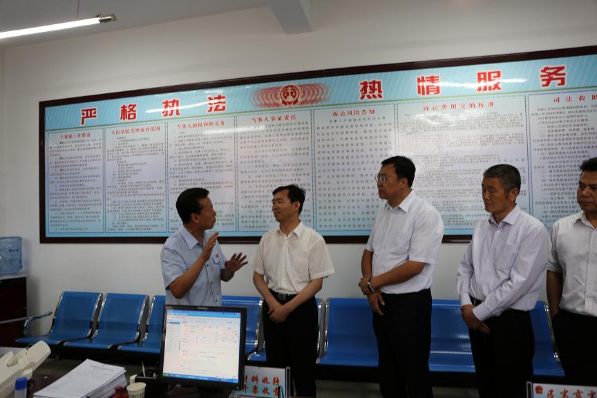 李万刚院长向李文章、张柱、金生平等区市县领导汇报法院工作.jpg